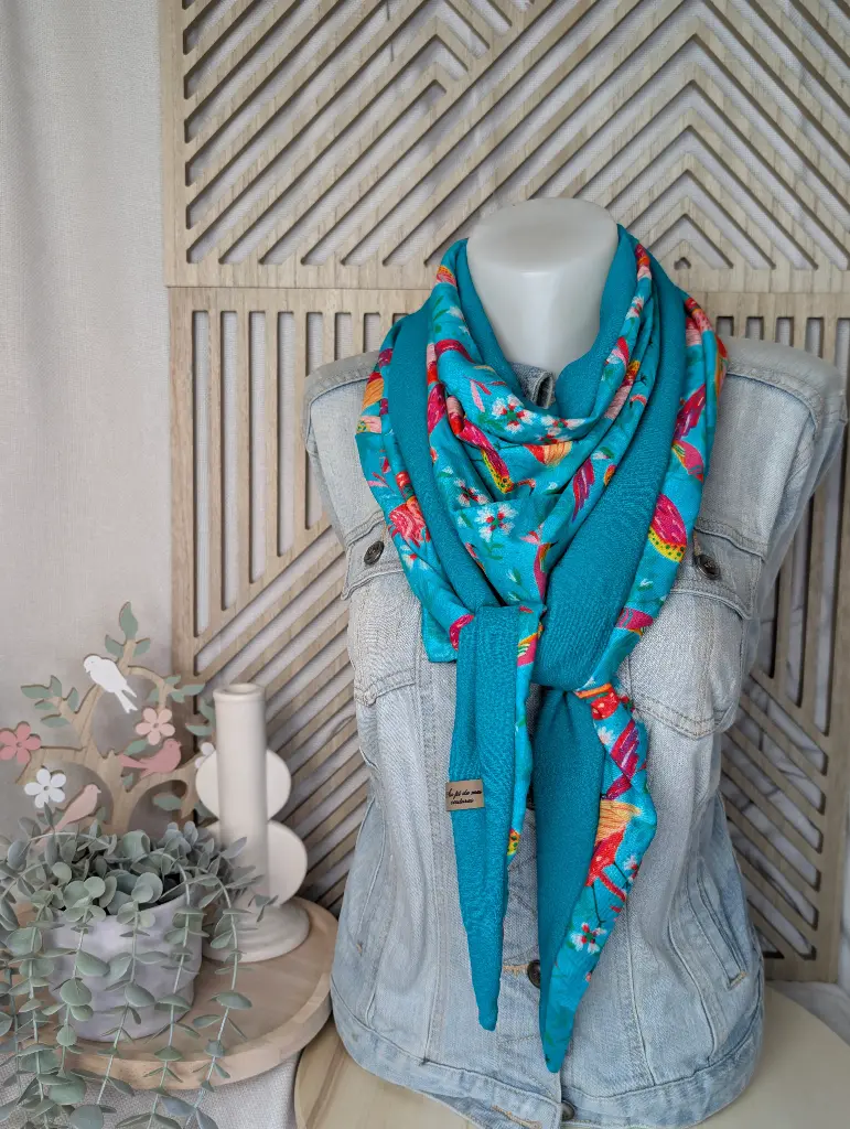 Petit réversible turquoise oiseaux oranges 